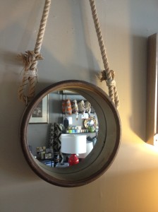 Rusted Round Mirror,  Priced at $102